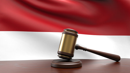 Monaco country national flag with judge gavel hammer on court desk concept of constitutional law and justice based on wood desk table 3d rendering imageの写真素材