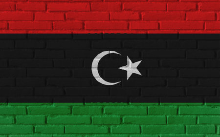 Libya country national flag painting on old brick textured wall with cracks and concrete concept 3d rendering image realistic background bannerの写真素材