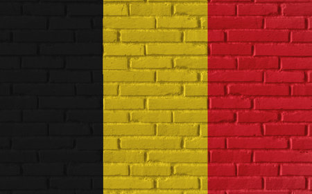 Belgium country national flag painting on old brick textured wall with cracks and concrete concept 3d rendering image realistic background bannerの写真素材