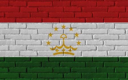 Tajikistan country national flag painting on old brick textured wall with cracks and concrete concept 3d rendering image realistic background bannerの写真素材