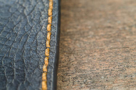 macro skin with a seam on a wooden surfaceの写真素材
