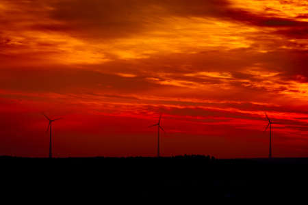 Wind turbines at sunset .Golden hourの写真素材