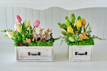 Tulip Artificial flower arrangements on white furnitureの写真素材