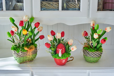 Tulip Artificial flower arrangements on white furnitureの写真素材