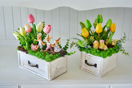 Tulip Artificial flower arrangements on white furnitureの写真素材