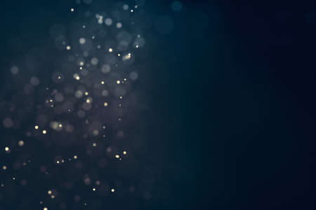 Glitter lights defocused background. Bokeh dark illustrationの写真素材
