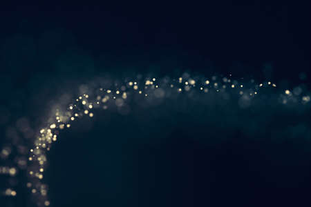 Glitter lights defocused background. Bokeh dark illustrationの写真素材