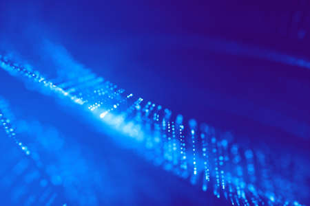 Glitter lights abstract blue background. Defocused bokeh illustrationの写真素材