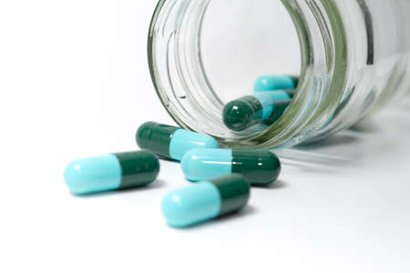 Close up shot of pills isolated on white background.