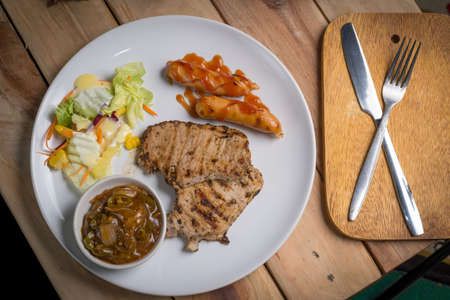 Pork Steak with Black Pepper on wood table