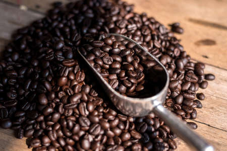 coffee beans on wood tableの写真素材