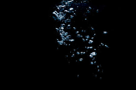 bubbles water on dark background with text space