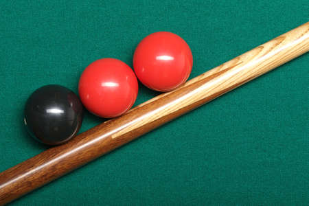 a snooker queue with tree balls