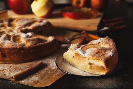 Apple pie with apples on a backgroundの写真素材