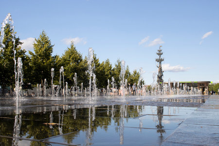Dry fountain in Muzeon Park on the background of the monument to Peter the Great, Gorky Park, Moscow, Russiaのeditorial素材