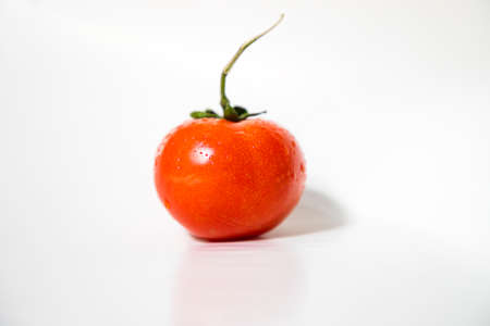 Fresh Red Ripe Tomato Isolated On Background. Natural Raw organic healthy vegetable Saladの写真素材