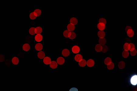 Abstract bokeh light effects on the night. Black background with colorful light effects. background...