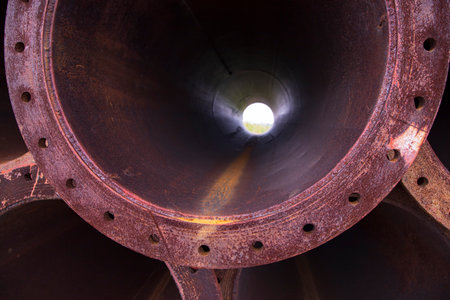 Close-up focus Rusted iron steel metal pipe hole can be used as an industrial texture background