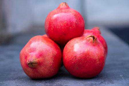 Ripe pomegranates on a dark background. Selective focus.の写真素材
