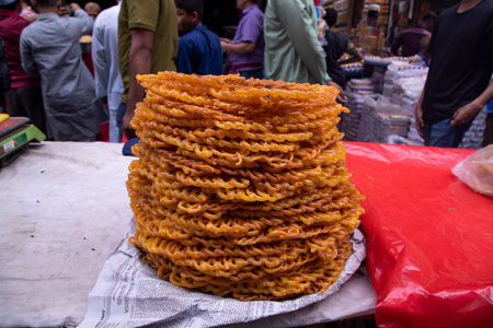 Delicious Testy sweet fried jalebi showing for sale on a street food market in the Chakbazar, Dhaka-Bangladeshの写真素材