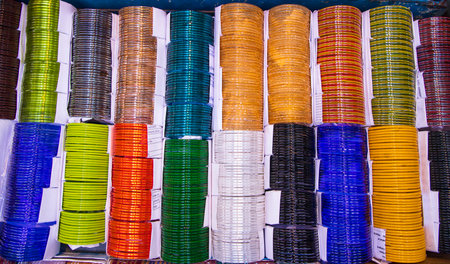 Multi-colored Glass Bangles for sale  can be used as a background texture wallpaperの写真素材