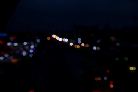 Colorful Defocus Abstract bokeh street lights effects on the night black background texture