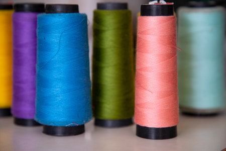 Some multicolor Spools of  swings thread Close-up Focus