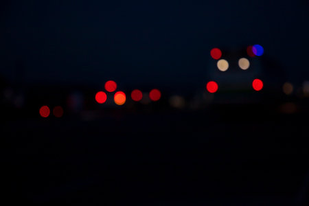 Night city street traffic abstract blurry bokeh lights background