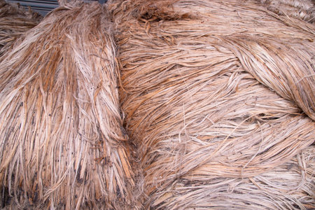 Folded Stacked Golden jute fiber abstract Pattern Texture  Can be used as a Background wallpaperの写真素材