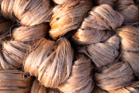 Thick Golden bundle of raw jute fiber Pattern Texture Can be used as a Background wallpaper. This is the Called Golden Fiber in Bangladeshの写真素材