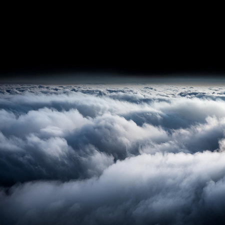 Aerial view of clouds and sky from airplane window during flight.の素材