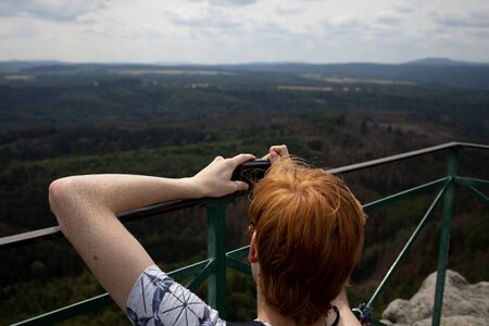 Tourist photographing the landscape.