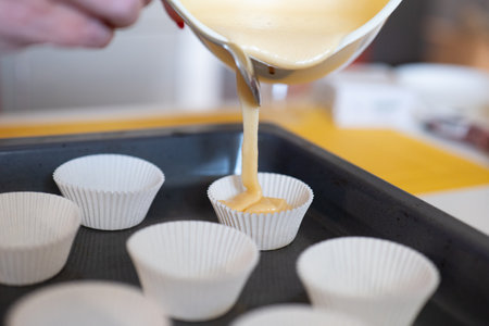 Preparation of cupcakes in the kitchen. Selective focus.