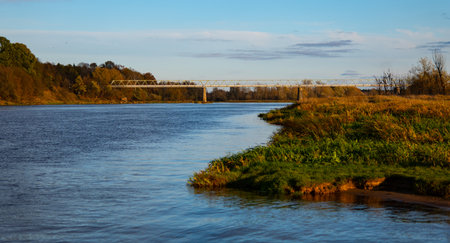 Bridge over the river. Autumn landscape. Poland, Narew riverの写真素材