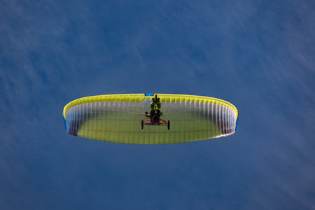 Paraglider in the blue sky. Paragliding in the blue sky.