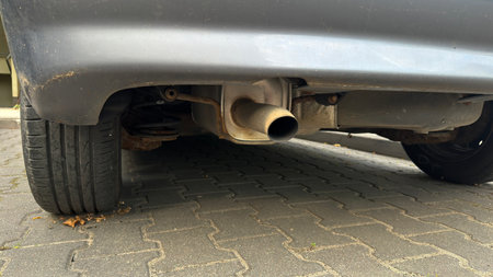 Close-up of a car exhaust pipe and exhaust pipe of a car.の写真素材