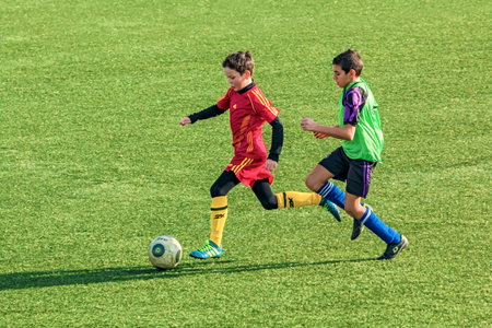 Kropotkin, Krasnodar region, Russia - February 10, 2018. Soccer sports competition between teenage teams.のeditorial素材