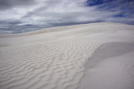 White sand dunes, dramatic sky, Western Australiaの写真素材