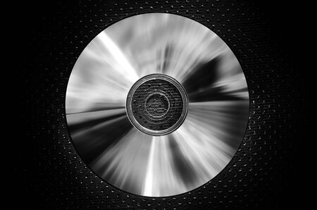 a CD on texture background-dark silverの写真素材