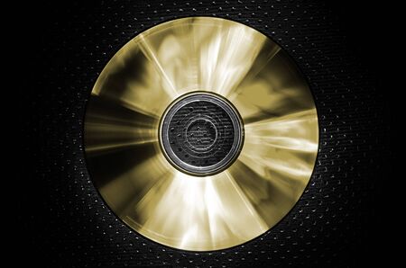 a CD on texture background-goldの写真素材