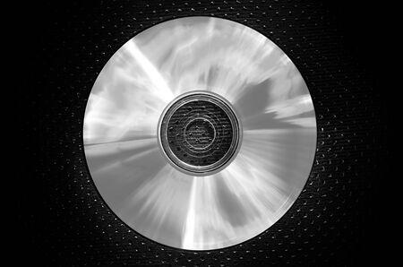 a CD on texture background-light silverの写真素材