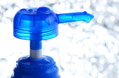 closeup of transparent pump of bottle with bubble in tubeの写真素材