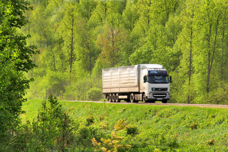 BASHKORTOSTAN, RUSSIA - MAY 20, 2013  White Volvo FH12 semi-trailer truck at the interurban road のeditorial素材