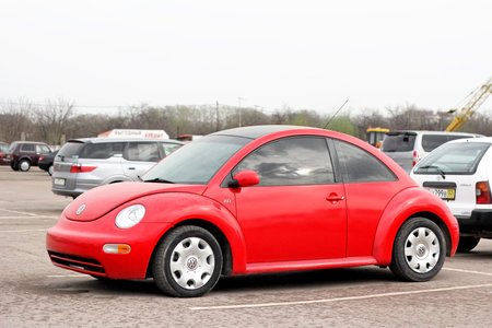 UFA, RUSSIA - APRIL 19, 2012: Red compact car Volkswagen Beetle in the used cars trade center.のeditorial素材