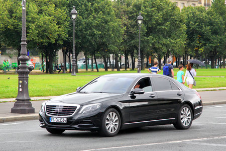 PARIS, FRANCE - AUGUST 8, 2014: Black luxury car Mercedes-Benz W222 S-class at the city street.のeditorial素材