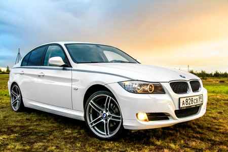 NOVYY URENGOY, RUSSIA - AUGUST 21, 2015: Motor car BMW E90 318i at the countryside.のeditorial素材