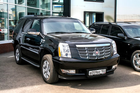 UFA, RUSSIA - JUNE 21, 2008: Motor car Cadillac Escalade at the trade center.のeditorial素材