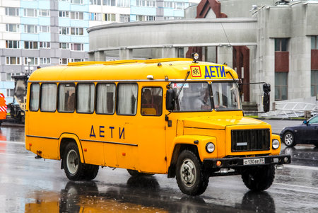 NOVYY URENGOY, RUSSIA - AUGUST 20, 2012: Yellow school bus KAVZ 39765 at the city street.のeditorial素材