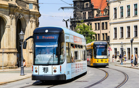 DRESDEN, GERMANY - JULY 20, 2014: Articulated trams Bombardier NGT D8 DD at the city street.のeditorial素材