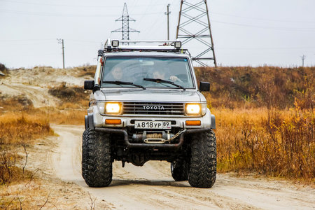 NOVYY URENGOY, RUSSIA - SEPTEMBER 19, 2015: Motor car Toyota Land Cruiser Prado 70 at the autumn...